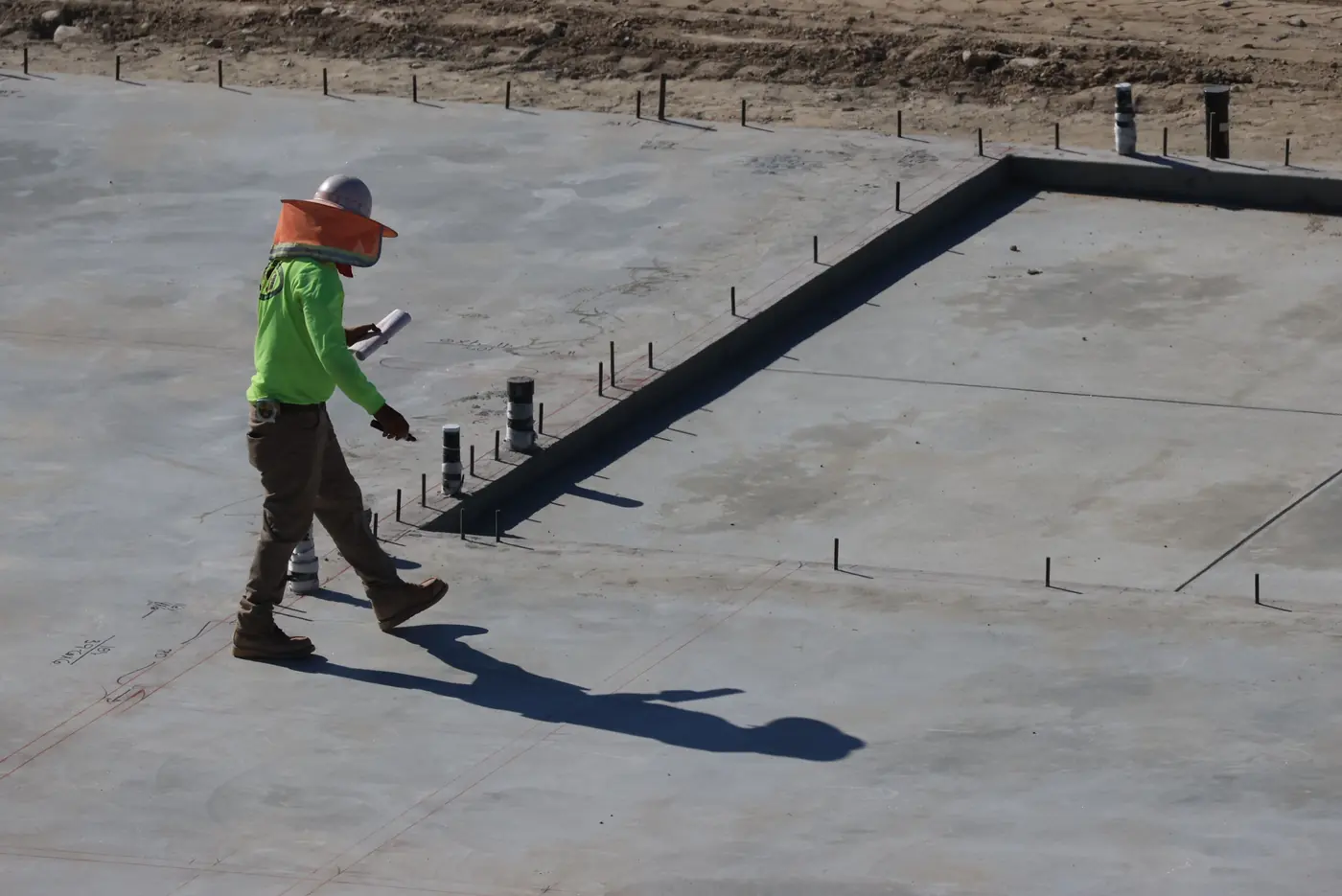 Forms set and the sub-base graded flat ahead of a residential concrete pour